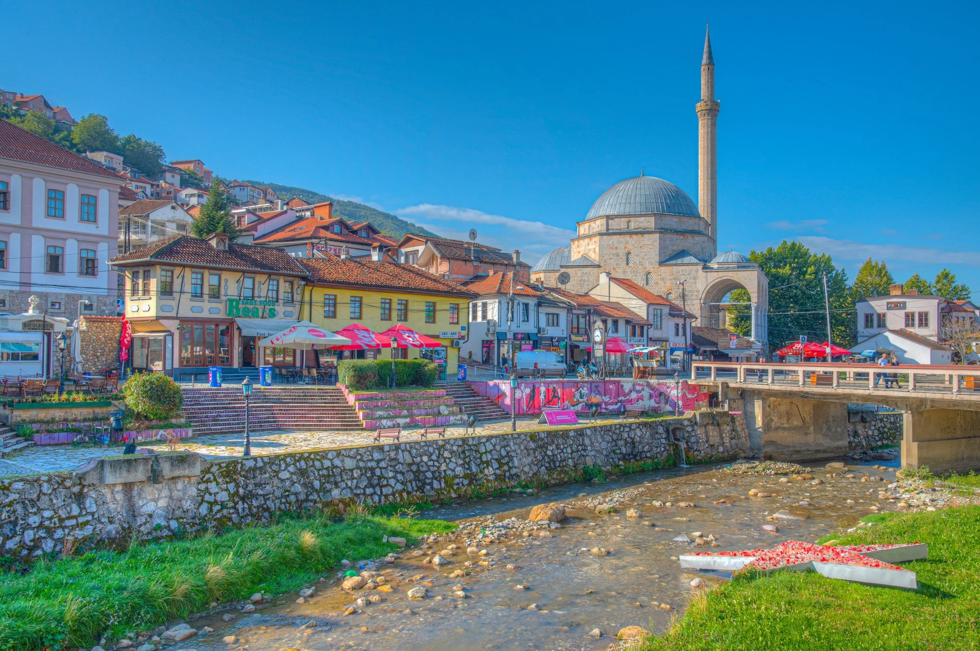 PRIZREN, KOSOVO, SEPTEMBER 20, 2019: Sinan Pasha mosque situated on riverside of Bistrica river in center of Prizren, Kosovo